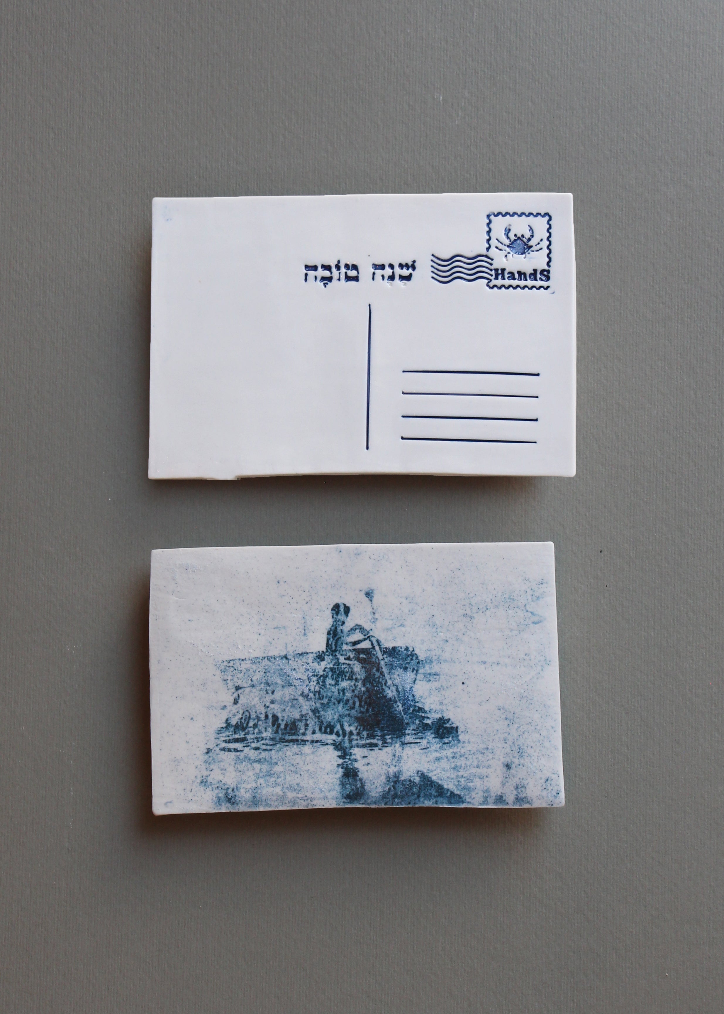 ילד חותר על סירה קטנה, בול מזל סרטן