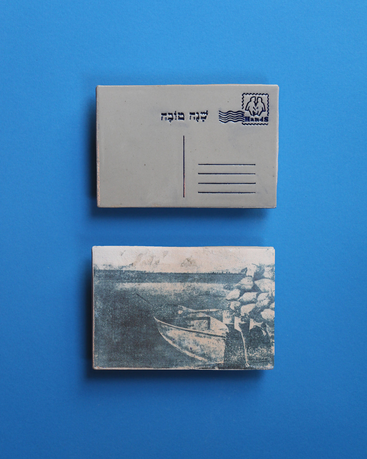 סירת דייגים עוגנת בכנרת, בול מזל תאומים