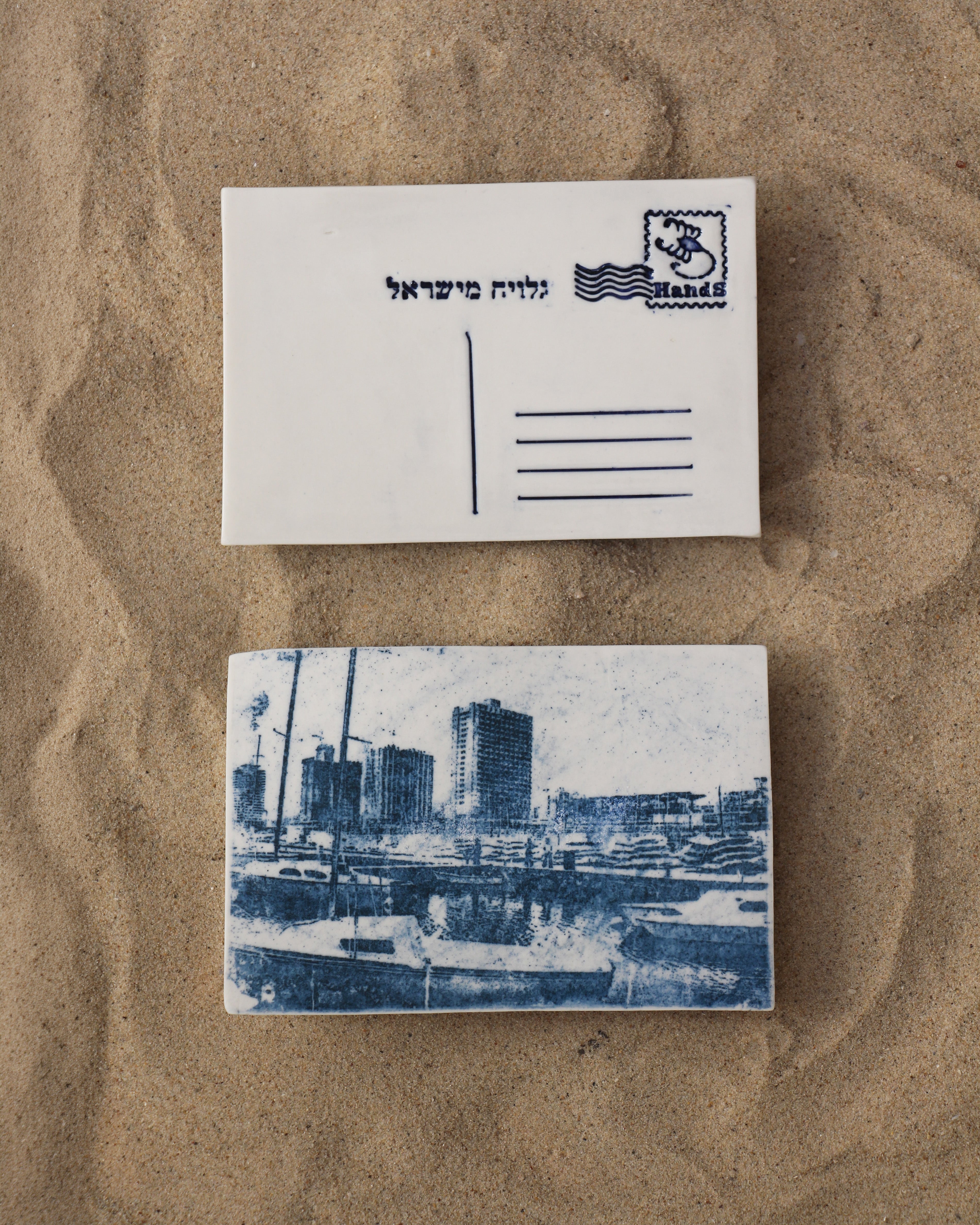 מבט על הטיילת והמלונות מהחוף,בול מזל עקרב