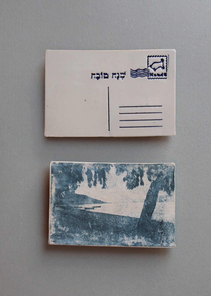 סירות עוגנות בגדת הכנרת, בול מזל שור